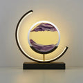LED sand art table lamp with circular frame