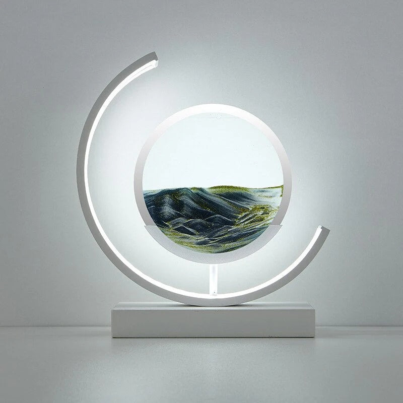 LED sand art table lamp with circular frame