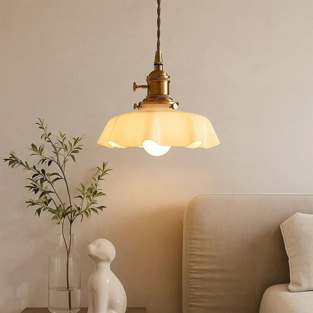Pendant light with scalloped cream glass shade