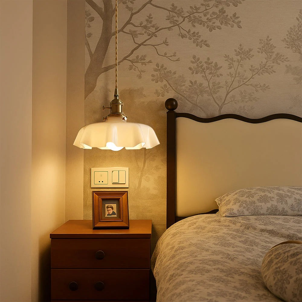 Pendant light with scalloped cream glass shade
