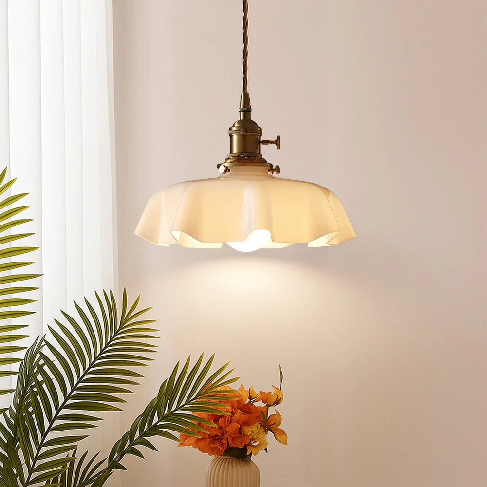 Pendant light with scalloped cream glass shade