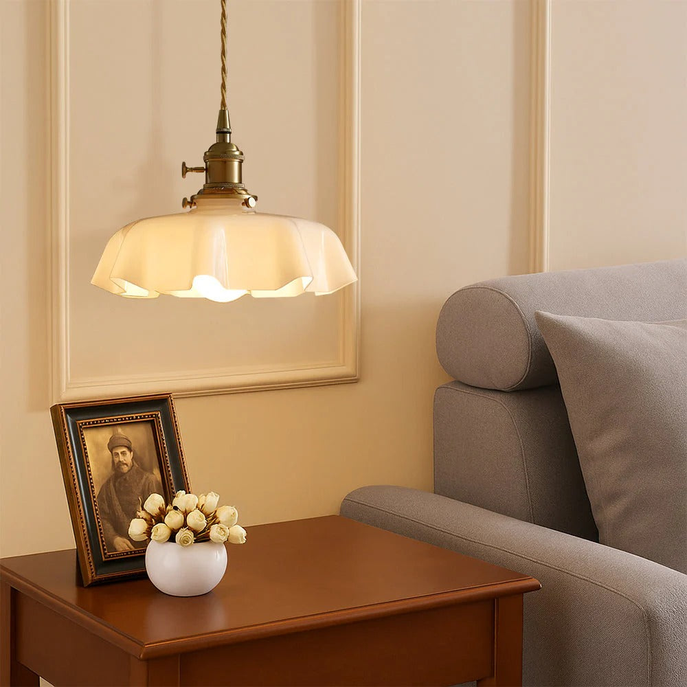 Pendant light with scalloped cream glass shade