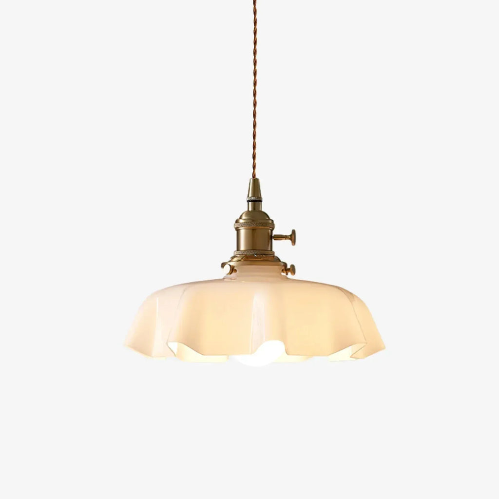 Pendant light with scalloped cream glass shade